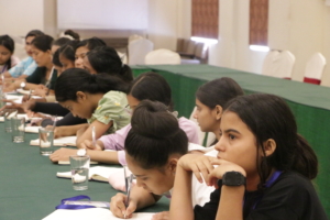 Adolescent girls listen attentively to a talk on sexual and reproductive health and rights.